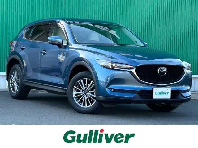 マツダ ＣＸ－５ XD Lパッケージ 宮城県 2018(平30)年 6.1万km エターナルブルーマイカ BOSEサウンドシステム/360度ビューモニター/フロントパーキングセンサー/＝＝＝/アドバンストスマートシティブレーキサポート/後退時スマートシティブレーキサポート/誤発進抑制制御/スマートブレーキサポート/レーダークルーズコントロール/ブラインドスポットモニタリング/車線逸脱警報システム/レーンキープアシストシステム/リアパーキングセンサー/ドライバーアテンションアラート/マツダコネクトナビ/・Bluetooth/・USB/ETC（バイザー裏）/パワーバックドア/ホワイトレザーシート/シートヒーター/ステアリングヒーター/パワーシート（運転席メモリー機能付）/革巻きステアリング/ステアリングウイッチ/電動パーキングブレーキ/ブレーキホールド/アダプティブLEDヘッドランプ/フォグランプ/オートライト/スマートキー＆プッシュスタート/電動格納ミラー/純正17インチAWレスオプション/純正ラバーマット/W/サイド/カーテンエアバッグ