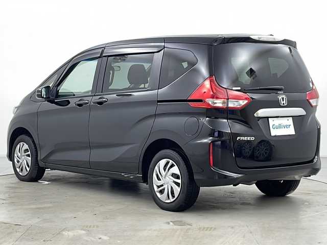 ホンダ フリード G ホンダセンシング 道央・札幌 2020(令2)年 5.9万km プレミアムスパークルブラックパール ・4WD/・寒冷地仕様/・ホンダセンシング/・アダプティブクルーズコントロール/・横滑り防止装置/・レーンキープアシスト/・純正ナビ（VXM-195VFi）/・BT/CD/DVD/SD/フルセグTV/・バックカメラ/・純正フリップダウンモニター/・両側パワースライドドア/・前席シートヒーター/・フロントワイパーデアイサー/・ドアミラーヒーター/・オートライト/・LEDヘッドライト/・積込スタッドレス社外AW付