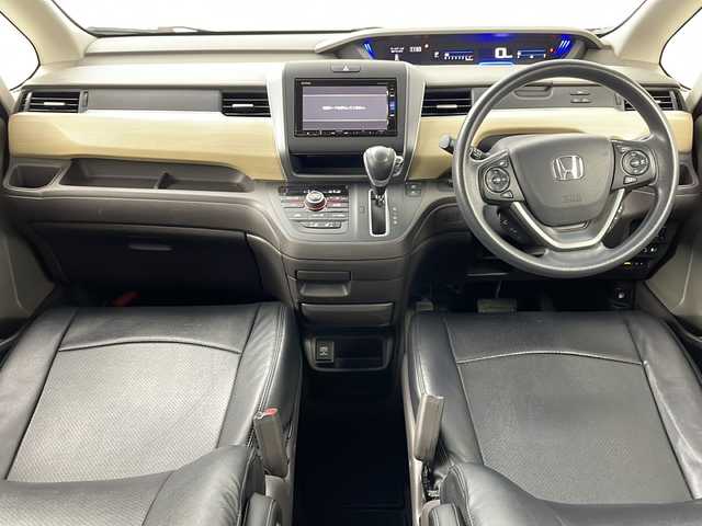 ホンダ フリード G ホンダセンシング 道央・札幌 2020(令2)年 5.9万km プレミアムスパークルブラックパール ・4WD/・寒冷地仕様/・ホンダセンシング/・アダプティブクルーズコントロール/・横滑り防止装置/・レーンキープアシスト/・純正ナビ（VXM-195VFi）/・BT/CD/DVD/SD/フルセグTV/・バックカメラ/・純正フリップダウンモニター/・両側パワースライドドア/・前席シートヒーター/・フロントワイパーデアイサー/・ドアミラーヒーター/・オートライト/・LEDヘッドライト/・積込スタッドレス社外AW付