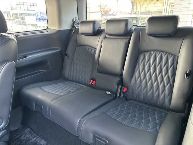 日産 エルグランド オーテック 福岡県 2024(令6)年 1.2万km ピュアホワイトパール 【ワンオーナー】/純正ナビ/iPod/SD/AM/FM/Bluetooth・CD/DVD/MusicStccker・HDMI/ETC(ビルド/ドライブレコーダー/純正フロアマット/クルーズコントロール/パワーシート（D.N)/オートライト/横滑り防止/電動格納ミラー/フリップダウンモニター/プッシュスタート/シートヒーター（D.N)/フォグランプ/Pスライドドア（両方）/電動リアゲート