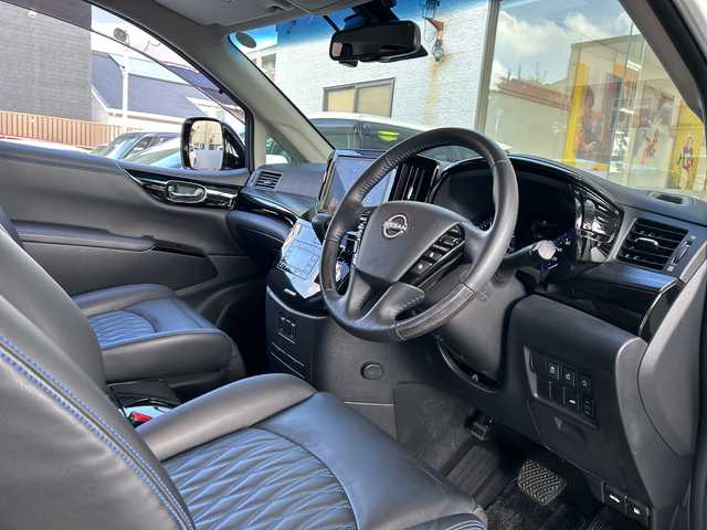 日産 エルグランド オーテック 福岡県 2024(令6)年 1.2万km ピュアホワイトパール 【ワンオーナー】/純正ナビ/iPod/SD/AM/FM/Bluetooth・CD/DVD/MusicStccker・HDMI/ETC(ビルド/ドライブレコーダー/純正フロアマット/クルーズコントロール/パワーシート（D.N)/オートライト/横滑り防止/電動格納ミラー/フリップダウンモニター/プッシュスタート/シートヒーター（D.N)/フォグランプ/Pスライドドア（両方）/電動リアゲート