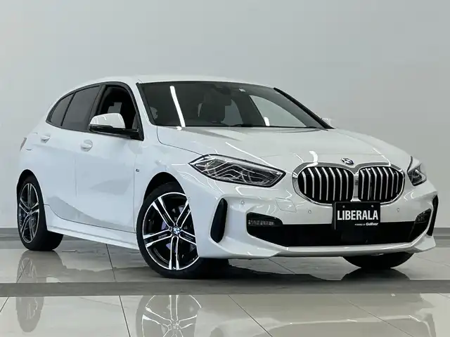 ＢＭＷ １１８ｉ Mスポーツ 岡山県 2020(令2)年 1.1万km 白 純ナビ/USB/BT/ACC/オートブレーキH/ドラレコ/ワイヤレス充電/Applecarplay/Androidauto/ライブコクピット/オートライト/LED/コンフォートアクセス/PWテールゲート