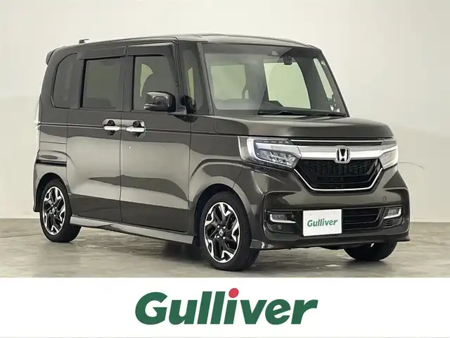 ホンダ Ｎ ＢＯＸ カスタム G EX ターボ ホンダセンシング 滋賀県 2017(平29)年 5.9万km プレミアムグラマラスブロンズP 禁煙車/純正ナビ/CD/DVD/USB/Bluetooth/フルセグTV/バックカメラ/ETC/ハーフレザーシート/追従クルーズコントロール/ホンダセンシング/プッシュスタート/スマートキー/両側パワースライドドア/純正アルミホイール/LEDヘッドライト/オートライト