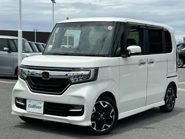 ホンダ Ｎ ＢＯＸ カスタム G L ターボ ホンダセンシング 奈良県 2018(平30)年 3.5万km プレミアムホワイトパールⅡ 社外ナビ /(BT/DVD/CD)/バックカメラ /地デジ /ハーフレザーシート /両側パワースライドドア /ビルトインETC /純正15型AW /LEDヘッドライト /リアサンシェード /車線逸脱警報 /革巻きステアリング
