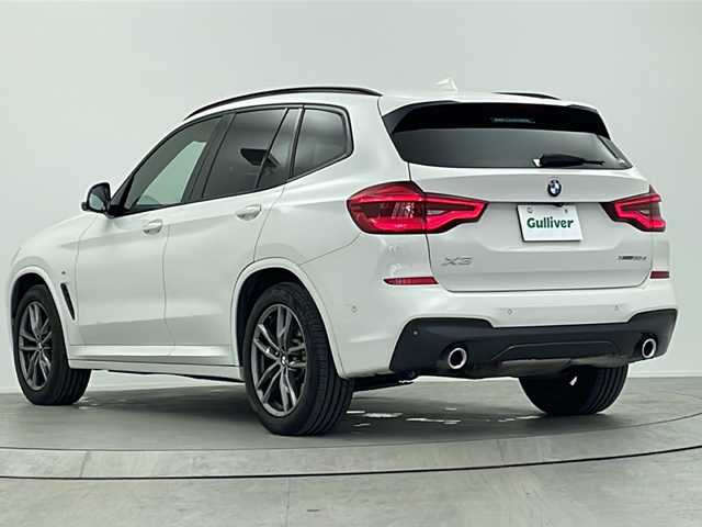 ＢＭＷ Ｘ３ xDrive20d Mスポーツ 大阪府 2018(平30)年 5.5万km アルピンホワイトⅢ 10.25インチワイド・コントロール・ディスプレイ/(フルセグTV/AM/FM/CD/DVD/USB/BT)/ヘッドアップディスプレイ/ブラインドスポットモニター/ドライブレコーダー/ETC/パーキング・アシスト・プラス/・パーク・ディスタンス・コントロール/・パーキング・アシスト/・トップ・ビュー/・サイド・ビュー・カメラ/・リヤ・ビュー・カメラ/ドライビング・アシスト・プラス/・アクティブ・クルーズ・コントロール/・ステアリング＆レーン・コントロール・アシスト/・レーン・ディパチャー・ウォーニング(車線逸脱警告システム)/・レーン・チェンジ・ウォーニング/・アクティブ・サイド・コリジョン・プロテクション/・全車接近警告機能/・衝突回避・被害軽減ブレーキ/・事故回避アシスト/・後車衝突警告機能/・クロス・トラフィック・ウォーニング(フロント＆リア)/ブラインドスポットモニター/オートホールド/パドルシフト/パワーバックドア/メモリシート/シートヒーター/シートメモリ/レザーシート/ルーフレール/スペアキー/取扱説明書/保証書/記録簿(R1.10/R2.11/R3.11/R5.11/R6.11)