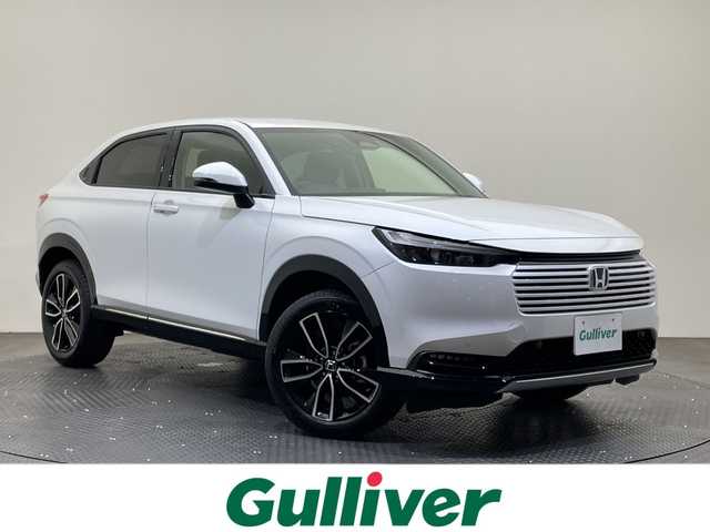 ホンダ ヴェゼル ハイブリッド e:HEV Z 愛媛県 2025(令7)年 0.1千km プラチナホワイトパール 登録済未使用車　純正９型ナビ　バックカメラ　衝突被害軽減ブレーキ　ホンダセンシング　フルセグ　Ｂｌｕｅｔｏｏｔｈ　電動リアゲート　レーンキープアシスト　アダプティブクルーズコントロール　ＥＴＣ２．０/ワイヤレス充電