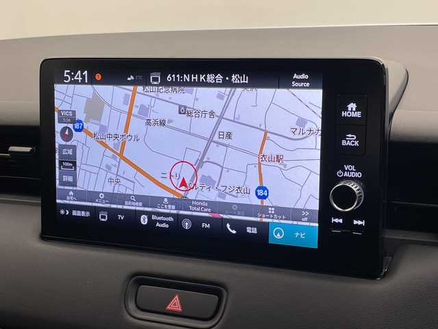 ホンダ ヴェゼル ハイブリッド e:HEV Z 愛媛県 2025(令7)年 0.1千km プラチナホワイトパール 登録済未使用車　純正９型ナビ　バックカメラ　衝突被害軽減ブレーキ　ホンダセンシング　フルセグ　Ｂｌｕｅｔｏｏｔｈ　電動リアゲート　レーンキープアシスト　アダプティブクルーズコントロール　ＥＴＣ２．０/ワイヤレス充電