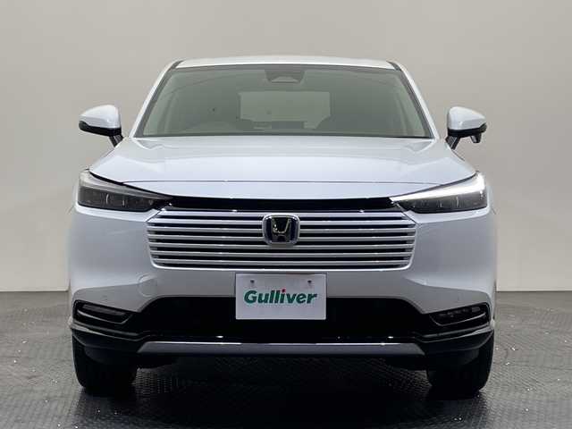 ホンダ ヴェゼル ハイブリッド e:HEV Z 愛媛県 2025(令7)年 0.1千km プラチナホワイトパール 登録済未使用車　純正９型ナビ　バックカメラ　衝突被害軽減ブレーキ　ホンダセンシング　フルセグ　Ｂｌｕｅｔｏｏｔｈ　電動リアゲート　レーンキープアシスト　アダプティブクルーズコントロール　ＥＴＣ２．０/ワイヤレス充電