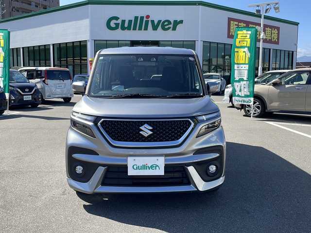 スズキ ソリオ バンディット HV MV 長野県 2023(令5)年 1.9万km プレミアムシルバーメタリック セーフティサポート/・デュアルセンサーブレーキサポート/・アダプティブクルーズコントロール/・リアパーキングセンサー/・車線逸脱警報機能/・車線逸脱抑制機能/・ハイビームアシスト/社外ナビ【AVN-LS02】/（CD/DVD/フルセグTV/Bluetooth）/ETC/シートヒーター（D・N席）/両側パワースライドドア/革巻きステアリング/ステアリングスイッチ/ヘッドアップディスプレイ/アイドリングストップ/LEDヘッドライト/フォグランプ/オートライト/スマートキー/Pスタート/電動格納ミラー/純正フロアマット/純正15インチAW