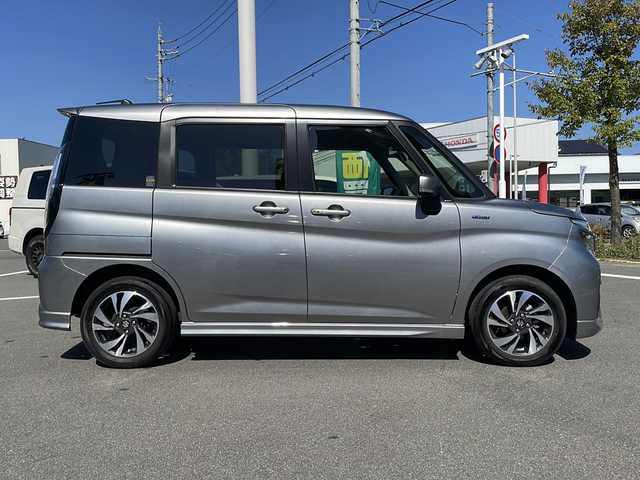 スズキ ソリオ バンディット HV MV 長野県 2023(令5)年 1.9万km プレミアムシルバーメタリック セーフティサポート/・デュアルセンサーブレーキサポート/・アダプティブクルーズコントロール/・リアパーキングセンサー/・車線逸脱警報機能/・車線逸脱抑制機能/・ハイビームアシスト/社外ナビ【AVN-LS02】/（CD/DVD/フルセグTV/Bluetooth）/ETC/シートヒーター（D・N席）/両側パワースライドドア/革巻きステアリング/ステアリングスイッチ/ヘッドアップディスプレイ/アイドリングストップ/LEDヘッドライト/フォグランプ/オートライト/スマートキー/Pスタート/電動格納ミラー/純正フロアマット/純正15インチAW