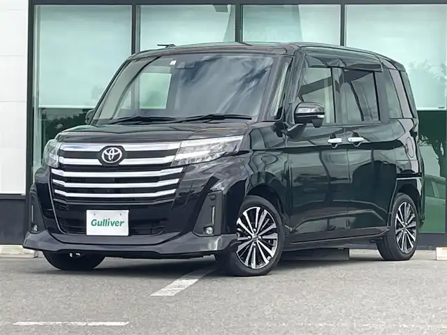 トヨタ ルーミー カスタムG－T 和歌山県 2023(令5)年 3.4万km ブラックマイカメタリック 純正9インチディスプレイオーディオ/全方位カメラ/衝突軽減ブレーキ/レーダークルコン/前後コーナーセンサー/オートライト/ビルトインETC/両側パワスラ/シートヒーター/ステアリングリモコン/オートホールド/純正15インチアルミ/電格ミラー/LEDヘッドライト/フォグランプ