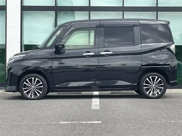 トヨタ ルーミー カスタムG－T 和歌山県 2023(令5)年 3.4万km ブラックマイカメタリック 純正9インチディスプレイオーディオ/全方位カメラ/衝突軽減ブレーキ/レーダークルコン/前後コーナーセンサー/オートライト/ビルトインETC/両側パワスラ/シートヒーター/ステアリングリモコン/オートホールド/純正15インチアルミ/電格ミラー/LEDヘッドライト/フォグランプ