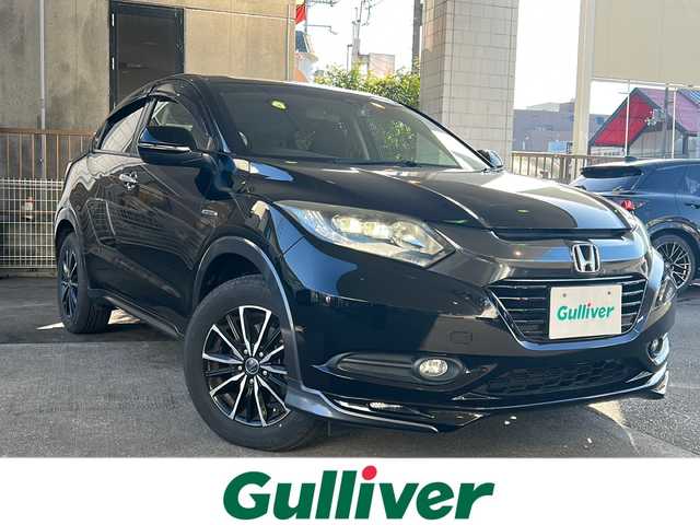 ホンダ ヴェゼル ハイブリッド X 京都府 2015(平27)年 14.2万km クリスタルブラックパール ワンオーナー /7インチSDナビ /ワンセグ/Bluetooth/CD/DVD再生機能/iPod/AUX/バックカメラ /禁煙 /LEDヘッドライト/フロントフォグランプ /クルーズコントロール /パドルシフト /フルフラットシート/ENKEI16インチAW /電動格納ミラー  /前方ドライブレコーダー (HDR002)/純正ETC/Wエアバッグ/カーテンエアバッグ