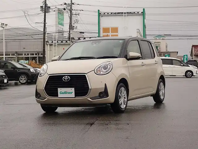 トヨタ パッソ モーダ　チャーム 山形県 2022(令4)年 3万km ブラックマイカメタリック/パウダリーベージュメタリック 2トーン 衝突被害軽減システム/純正SDナビ/　　【CD DVD BT フルセグ MSV AUX】/全周囲カメラ/LEDオートライト/ハーフレザーシート/シートヒーター/アイドリングストップ/コーナーセンサー/ステアリングスイッチ/フォグランプ/スマートキー/ETC