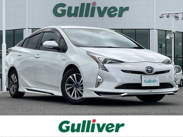 トヨタ プリウス A 佐賀県 2016(平28)年 9.4万km ホワイトパールクリスタルシャイン レーダークルーズコントロール/パーキングアシスト/レーンキープアシスト/衝突被害低減ブレーキ/ブラインドスポットモニター/オートマチックハイビーム/純正SDナビ/CD　DVD　SD　BT/バックカメラ/ビルトインETC/ヘッドアップディスプレイ/ステアリングリモコン/モデリスタエアロパーツ/モデリスタ15インチアルミホイール/純正LEDヘッドライト/フォグランプ/ウィンカーミラー/ドアバイザ―/プッシュスタート/スマートキー　