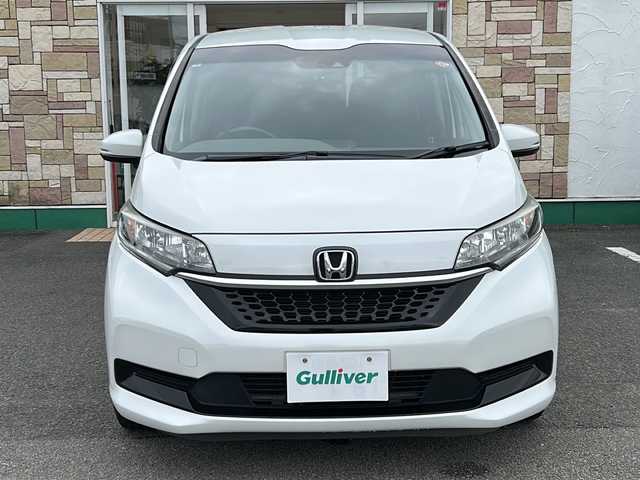 ホンダ フリード G ホンダセンシング 徳島県 2020(令2)年 5.8万km プラチナホワイトパール ・社外ナビ/・Bカメラ/・ETC/・フルセグTV/・クルコン/・CD/DVD/・Bluetooth/・両側パワースライドドア/・ウォークスルー/・３列シート/・LEDヘッドライト/・オートライト/・純正フロアマット