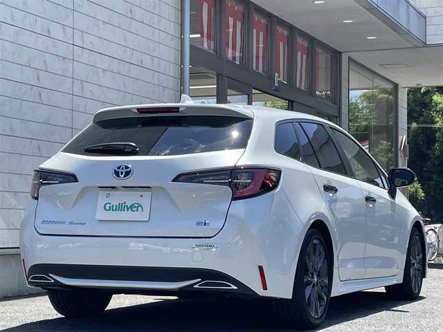 トヨタ カローラツーリング ハイブリッド ダブルバイビー 埼玉県 2022(令4)年 2.3万km プラチナホワイトパールマイカ ワンオーナー/外部検査済み/純正ディスプレイオーディオ/バックカメラ/プリクラッシュセーフティ/レーンキープ/クリアランスソナー/レーダークルーズコントロール/ステアリング/ステアリングスイッチ/電動パーキングブレーキ/プッシュスタート/LEDヘッドライト/スマートキー/スペアキー1本/ETC2.0