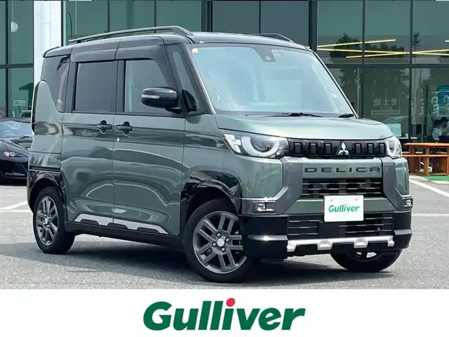 三菱 デリカミニ T プレミアム 奈良県 2023(令5)年 2.2万km 緑Ⅱ ９インチナビ　/フルセグＴＶ　/全方位カメラ　/前後ドライブレコーダー　/ＥＴＣ２．０　/マイパイロット　/両側ハンズフリーパワースライドドア　/デジタルインナーミラー　/ｅ－アシスト　/ハーフレザーシート　/シートヒーター　/ＡＡＣ/追従型クルーズコントロール/ルーフレール/ステアリングヒーター/ロールサンシェード/パドルシフト