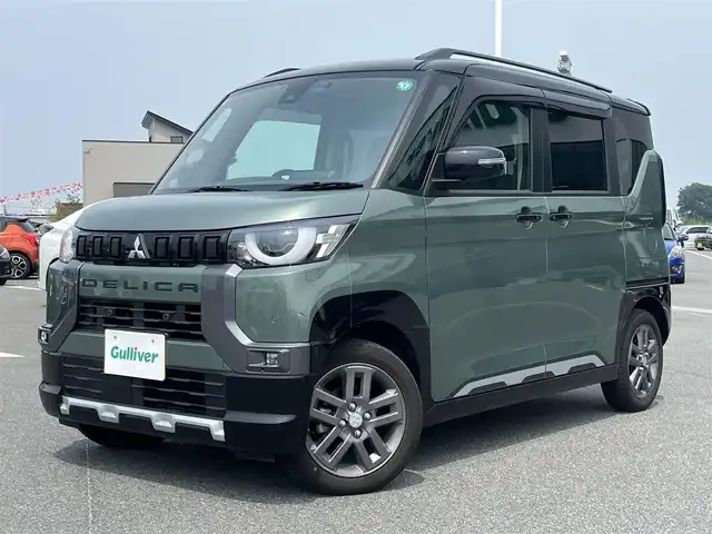 三菱 デリカミニ T プレミアム 奈良県 2023(令5)年 2.2万km 緑Ⅱ ９インチナビ　/フルセグＴＶ　/全方位カメラ　/前後ドライブレコーダー　/ＥＴＣ２．０　/マイパイロット　/両側ハンズフリーパワースライドドア　/デジタルインナーミラー　/ｅ－アシスト　/ハーフレザーシート　/シートヒーター　/ＡＡＣ/追従型クルーズコントロール/ルーフレール/ステアリングヒーター/ロールサンシェード/パドルシフト