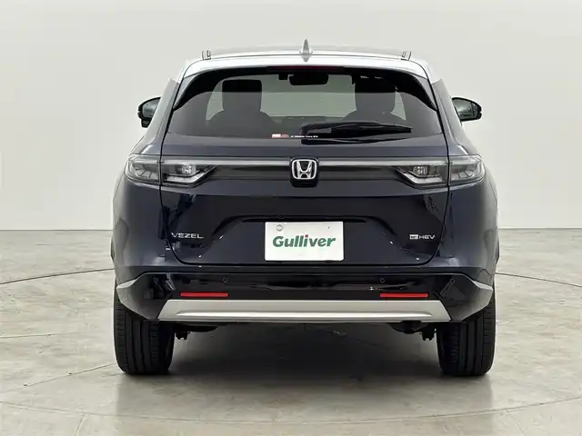 ホンダ ヴェゼル ハイブリッド e:HEV PLaY 福岡県 2023(令5)年 0.6万km ミッドナイトブルービームM ワンオーナー　/ガラスルーフ　/純正ナビ　/置くだけ充電　/ビルトインＥＴＣ２．０　/前後ドラレコ　/ホンダセンシング　/パドルシフト　/ハーフレザー　/シートヒーター　/ステアリングヒーター　/パワーバックドア　/ＬＥＤ