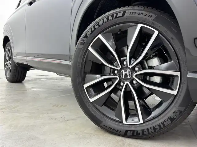 ホンダ ヴェゼル ハイブリッド e:HEV PLaY 福岡県 2023(令5)年 0.6万km ミッドナイトブルービームM ワンオーナー　/ガラスルーフ　/純正ナビ　/置くだけ充電　/ビルトインＥＴＣ２．０　/前後ドラレコ　/ホンダセンシング　/パドルシフト　/ハーフレザー　/シートヒーター　/ステアリングヒーター　/パワーバックドア　/ＬＥＤ