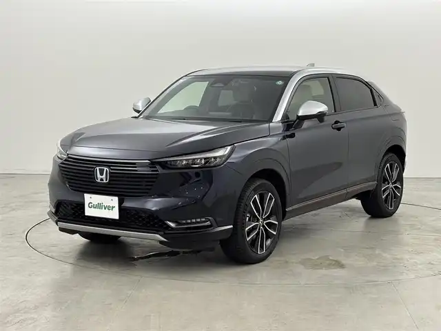 ホンダ ヴェゼル ハイブリッド e:HEV PLaY 福岡県 2023(令5)年 0.6万km ミッドナイトブルービームM ワンオーナー　/ガラスルーフ　/純正ナビ　/置くだけ充電　/ビルトインＥＴＣ２．０　/前後ドラレコ　/ホンダセンシング　/パドルシフト　/ハーフレザー　/シートヒーター　/ステアリングヒーター　/パワーバックドア　/ＬＥＤ