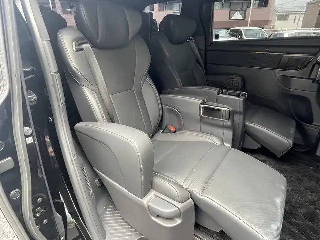 トヨタ アルファードハイブリット Z 福岡県 2024(令6)年 1万km ブラック ワンオーナー/ツインムーンルーフ/純正14インチコネクテッドナビ/　(Bluetooth/Miracast/フルセグTV)/パノラミックビューモニター/バックカメラ/デジタルインナーミラー/アドバンストパーク/アドバンストドライブ/トヨタセーフティセンス/・プリクラッシュセーフティ/・レーンディパーチャーアラート/・ロードサインアシスト/・レーダークルーズコントロール/・オートマチックハイビーム/ブラインドスポットモニター/安心降車アシスト/後方車両接近告知/周辺車両接近時サポート/クリアランスソナー/プロアクティブドライビングアシスト/フロント/リヤクロストラフィックアラート/リヤカメラディテクション/パーキングサポートブレーキ/両側パワースライドドア/パワーバックドア/純正18インチアルミホール/黒レザーシート/パドルシフト/ステアリングヒーター/パワーシート/シートヒーター/ベンチレーション/シートメモリー/電動サンシェード(2.3列目)/前後ドライブレコーダー/ETC2.0/純正フロアマット/置くだけ充電/スペアタイヤ/USBタイプCポート/100V電源