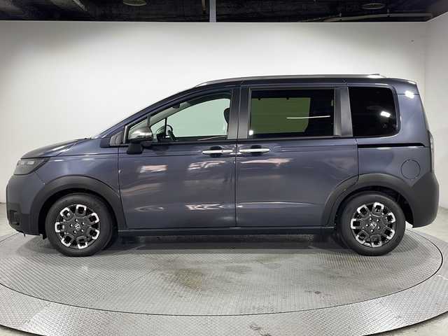 ホンダ フリード ハイブリット e:HEV クロスター 広島県 2025(令7)年 0.1千km メテオロイドグレーメタリック 登録済未使用車　5Km/純正９型ナビ/バックカメラ/シートヒーター/両側パワースライドドア/レーダークルーズコントロール/オートマチックハイビーム/衝突被害軽減ブレーキ/レーンキープアシスト/踏み間違い防止/ブラインドスポットモニター/ホールド機能付電動パーキングブレーキ/コーナーセンサー/LEDヘッドライト/純正15インチアルミホイール(185/65/R15)/エアバッグ(運転席/助手席/サイド/カーテン)