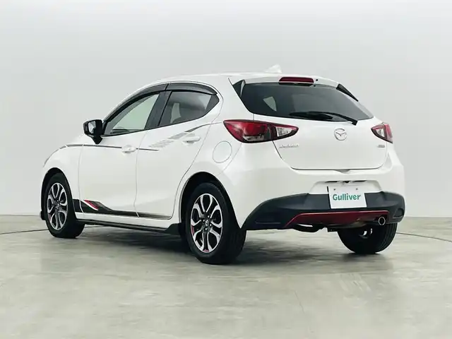 マツダ デミオ XD ブラックレザーリミテッド 福島県 2016(平28)年 6.6万km スノーフレイクホワイトパールマイカ 衝突軽減/・車線逸脱警報/・オートマチックハイビーム/・GVC/純正エアロ（フロント サイド）/純正7インチディスプレイオーディオ/・フルセグ/TV/BT/USB/AUX/SD/CD/DVD/FM/AM/バックカメラ/クルーズコントロール/LEDオートライト/・フォグライト/ハーフレザー/・シートヒーター/純正アルミホイール付きサマータイヤ/革ステアリング/・ステアリングリモコン/・パドルシフト/アイドリングストップ/純正フロアマット/純正ドアバイザー/アイドリングストップ/電動格納ミラー/・ウィンカーミラー/MTモード付AT/プッシュスタート/・スマートキー