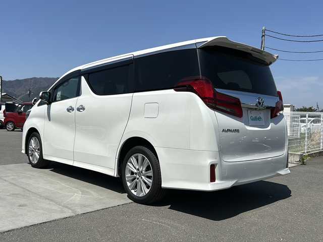 トヨタ アルファード S 山梨県 2023(令5)年 1.8万km ホワイトパールクリスタルシャイン ディスプレイオーディオ/バックカメラ/両側パワースライドドア/ETC/クルーズコントロール/禁煙車/LEDヘッドライト/Bluetooth再生/純正１８インチアルミ/衝突軽減システム/オートマチックハイビーム/コーナーセンサー/スペアキー/フリップダウンモニター