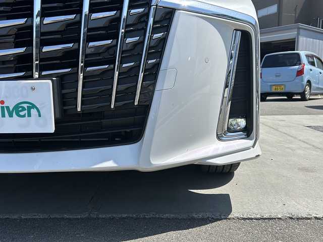 トヨタ アルファード S 山梨県 2023(令5)年 1.8万km ホワイトパールクリスタルシャイン ディスプレイオーディオ/バックカメラ/両側パワースライドドア/ETC/クルーズコントロール/禁煙車/LEDヘッドライト/Bluetooth再生/純正１８インチアルミ/衝突軽減システム/オートマチックハイビーム/コーナーセンサー/スペアキー/フリップダウンモニター