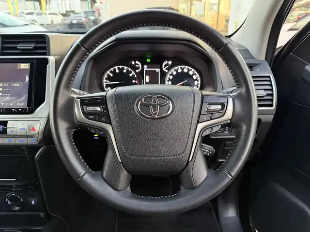 トヨタ ランドクルーザー プラド TX Lパッケージ ブラックED 兵庫県 2020(令2)年 3.8万km アティチュードブラックマイカ 7人乗り/アルパイン9インチナビ/　（AM/FM/CD/DVD/SD/BT/USB)/フルセグTV/バックカメラ/ステアリングリモコン/プリクラッシュセーフティー/レーンアシスト/クルーズコントロール/先行車発進告知/横滑り防止装置/オートライト/オートハイビーム/ビルドインETC/レザーシート/前席パワーシート/前席（シートヒーター・エアシート）/純正フロアマット/LEDヘッドライト/ヘッドライトウォッシャー/クリアランスソナー/ルーフレール/純正18インチアルミホイール