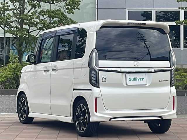 ホンダ Ｎ ＢＯＸ カスタム G EX ターボ ホンダセンシング 福島県 2017(平29)年 10.8万km プレミアムホワイトパールⅡ 4WD/ターボ車/社外SDナビ(CN-RA03D)/【フルセグ/BT/DVD/CD/USB/SD/AM/FM/iPod】/バックカメラ/ビルトインETC/社外前方ドライブレコーダー/両側パワースライド/Honda SENSING/・衝突軽減ブレーキ/・オートハイビーム/・誤発進抑制機能/・後方誤発進抑制機能/・路外逸脱警報機能/・アダプティブクルーズコントロール/・車線維持支援システム/・歩行者事故低減ステアリング/・先行車発進お知らせ機能/・標識認識機能/(最高速度、はみ出し通行禁止、一時停止、進入禁止)/アイドリングストップ/ハーフレザー/パドルシフト/ステアリングスイッチ/サンシェード/社外ドアバイザー/社外フロアマット/保証・取説/スペアキーx1