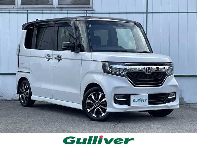 ホンダ Ｎ ＢＯＸ カスタム G L ホンダセンシング 山梨県 2019(令1)年 5.6万km プラチナホワイトパール 純正メモリナビ(VXM-194VFi)/純正CD/DVD/Bluetooth接続/フルセグTV/バックカメラ/ETC/ドライブレコーダー/片側電動スライドドア/衝突被害軽減システム/レーンキープアシスト/スペアキー1本/取扱説明書/保証書