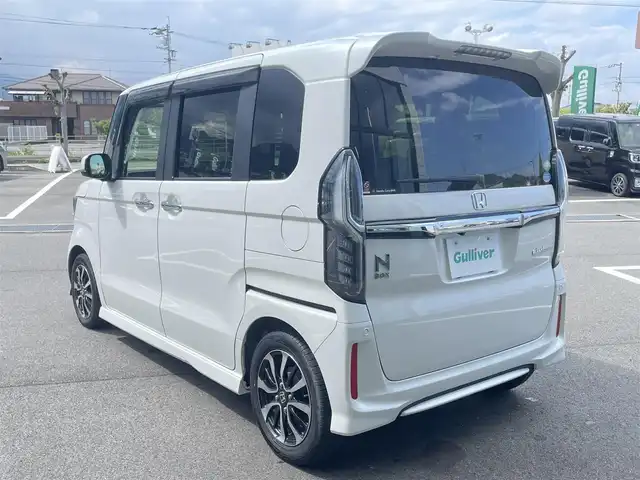 ホンダ Ｎ ＢＯＸ カスタム G L ホンダセンシング 愛媛県 2020(令2)年 4.4万km プラチナホワイトパール 純正8型ナビ/　(Bluetooth/CD/DVD)/フルセグTV/両側パワースライドドア/バックカメラ/ビルトインETC/アダプティブクルーズコントロール/ソナーセンサー/ホンダセンシング/・衝突軽減ブレーキ/・誤発進抑制機能(前後)/・歩行者事故低減ステアリング/・先行車発進お知らせ機能/・車線維持支援システム/・オートハイビーム/・標識認識機能/LEDヘッドランプ/ステアリングスイッチ/前席シートヒーター/純正14インチアルミホイール/スマートキーシステム/プッシュエンジンスタート/禁煙車