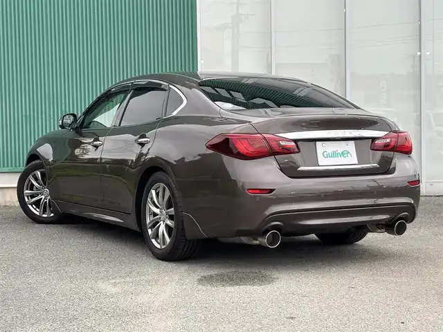 日産 フーガ 370GT FOUR 福岡県 2015(平27)年 2.4万km ブラックパール 〇純正ナビ/〇フルセグTV/〇ETC/〇ドライブレコーダー/〇プレミアムインテリアパッケージ/〇ブラウンセミアニリン革シート/〇インテリジェントクルーズコントロール/〇全方位運転支援システム/〇LEDヘッドランプ/〇オートライト/〇純正18インチアルミホイール/〇純正フロアマット/〇革巻きステアリングホイール/〇SRSエアバッグ/〇フォレストエアコン/〇パワーシート/パワーオットマン(助手席)/〇アームレスト/〇インテリジェントキー/アラウンドビューモニター/〇スペアキー/〇禁煙車