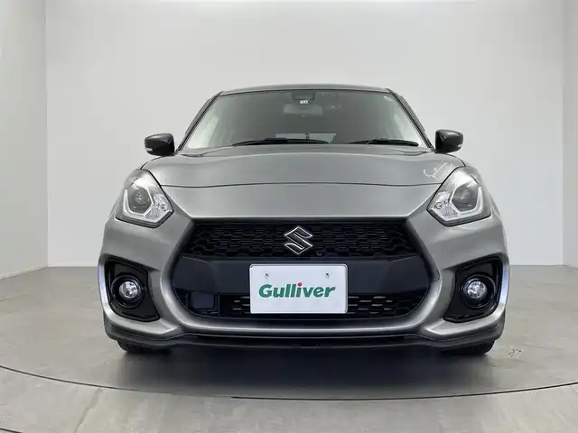スズキ スイフト スポーツ 大阪府 2022(令4)年 2.8万km プレミアムシルバーメタリック ワンオーナー/HKSマフラー/Wedssportアルミホイール(SA99R)/モンスタースポーツ/・シフトノブ/・ウインドウエアロバイザー/・ドアプロテクター/追加レーダー(ASSURA/AR-47LA)/社外ナビ(KENWOOD/MDV-S809L)/・フルセグTV/・Bluetooth/・CD/DVD/・USB接続/・HDMI/衝突軽減システム/追従クルーズコントロール/前後コーナーセンサー/バックカメラ/スペアキー/保証書/取扱説明書/点検記録簿