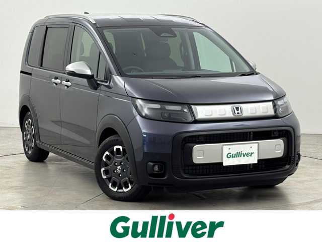 ホンダ フリード ハイブリット e:HEV クロスター 福岡県 2025(令7)年 0.1千km メテオロイドグレーメタリック 登録済未使用車　/純正９型ナビ／フルセグＴＶ／ＢＴ　/両側パワースライドドア　/バックカメラ　/レーダークルーズコントロール　/ＢＳＭ　/衝突軽減被害システム　/レーンキープ　/コーナーセンサー　/シートヒーター