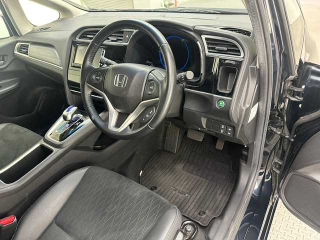 ホンダ シャトル ハイブリッド Z 兵庫県 2015(平27)年 3.2万km ミッドナイトブルービームM 純正SDナビ(CD/DVD/Bluetooth/フルセグ)/バックカメラ/パドルシフト/クルーズコントロール/ハーフレザーシート/シートヒーター/LEDヘッドライト/オートライト/フォグライト/純正16インチアルミホイール/純正フロアマット/ETC