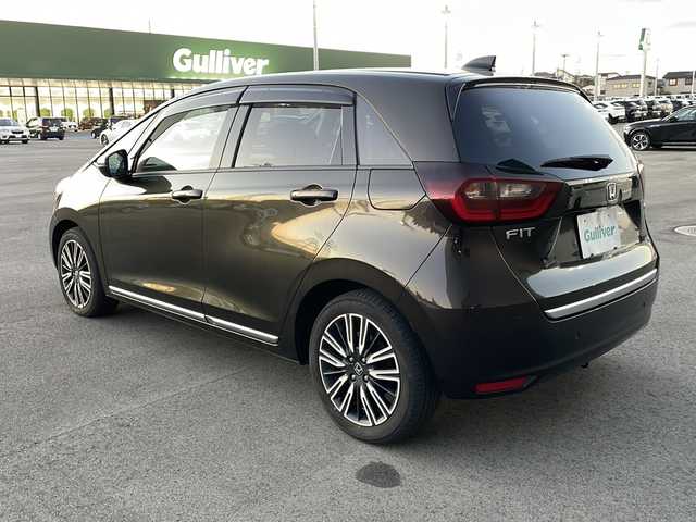 ホンダ フィット e:HEVリュクス 新潟県 2020(令2)年 2.4万km プレミアムグラマラスブロンズP 純正9インチナビ/バックカメラ/置くだけ充電/Blueooth/USB/プッシュスタート/スマートキー/ETC/ホンダエセンシング/シートヒーター/LEDヘッドライト/ハーフレザー/前後ドラレコ/純正フロアマット/純正アルミホイール