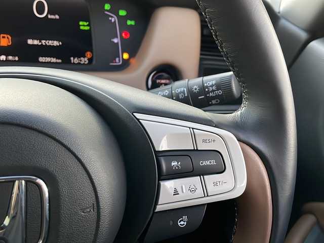 ホンダ フィット e:HEVリュクス 新潟県 2020(令2)年 2.4万km プレミアムグラマラスブロンズP 純正9インチナビ/バックカメラ/置くだけ充電/Blueooth/USB/プッシュスタート/スマートキー/ETC/ホンダエセンシング/シートヒーター/LEDヘッドライト/ハーフレザー/前後ドラレコ/純正フロアマット/純正アルミホイール