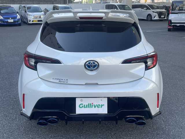 トヨタ カローラ スポーツ ハイブリッドG Z 神奈川県 2024(令6)年 0.8万km プラチナホワイトパールマイカ Toyota Safety Sense/・プリクラッシュセーフティ/・レーントレーシングアシスト/・レーンディパーチャーアラート/・プロアクティブドライビングアシスト/・オートマチックハイビーム/・ロードサインアシスト/・レーダークルーズコントロール/・発進遅れ告知機能/・ドライバー異常時対応システム/ブラインドスポットモニター/Tom’sエアロ/Tom’sマフラー/GRアルミペダル/純正ナビ＆フルセグTV/BT/タイプC/HDMI/バックカメラ/ビルトインETC2.0/前席シートヒーター/電動パーキングブレーキ/純正18inアルミホイール/オートライト/LEDライト/フォグランプ/オート電格ミラー/ウインカーミラー/スマートキー/プッシュスタート/W＆サイド＆カーテンエアバッグ/横滑り防止装置/ABS/ドアバイザー/保証書/取扱説明書/スペアキー