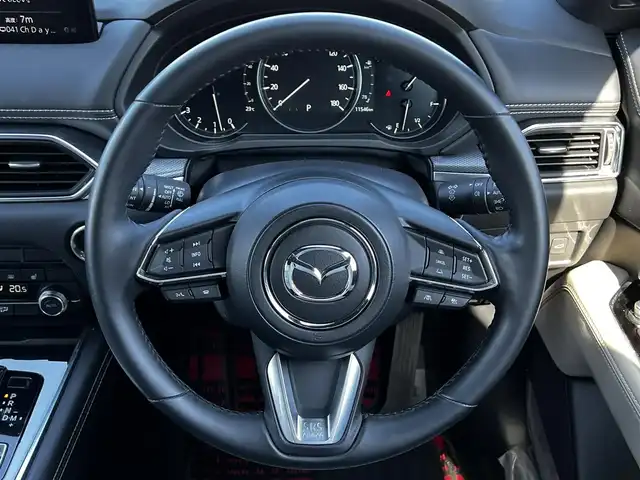 マツダ ＣＸ－８ 25S グランドジャーニー 道央・札幌 2024(令6)年 1.2万km マシーングレープレミアムM ４WD/純正メーカーOPナビ/AM/FM/BT/フルセグ/社外フリップダウンモニター/衝突被害軽減ブレーキ/横滑り防止装置/レーダークルーズコントロール/レーンキープアシスト/クリアランスソナー/ブラインドスポットモニター/バックカメラ/フロントカメラ/サイドカメラ/全方位カメラ/アラウンドビューモニター/ETC/アイドリングストップ/前席パワーシート/メモリーシート/前席＋セカンドシートヒーター/ハーフレザーシート/革巻きステアリング/ステアリングリモコン/ハンドルヒーター/電動パーキング/オートブレーキホールド/自動防眩ミラー/MTモード付AT/プッシュスタート/スマートキー/LEDヘッドライト/オートライト/オートマチックハイビーム/電動格納ミラー/ウィンカーミラー/社外フロアマット