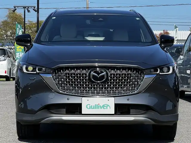 マツダ ＣＸ－８ 25S グランドジャーニー 道央・札幌 2024(令6)年 1.2万km マシーングレープレミアムM ４WD/純正メーカーOPナビ/AM/FM/BT/フルセグ/社外フリップダウンモニター/衝突被害軽減ブレーキ/横滑り防止装置/レーダークルーズコントロール/レーンキープアシスト/クリアランスソナー/ブラインドスポットモニター/バックカメラ/フロントカメラ/サイドカメラ/全方位カメラ/アラウンドビューモニター/ETC/アイドリングストップ/前席パワーシート/メモリーシート/前席＋セカンドシートヒーター/ハーフレザーシート/革巻きステアリング/ステアリングリモコン/ハンドルヒーター/電動パーキング/オートブレーキホールド/自動防眩ミラー/MTモード付AT/プッシュスタート/スマートキー/LEDヘッドライト/オートライト/オートマチックハイビーム/電動格納ミラー/ウィンカーミラー/社外フロアマット