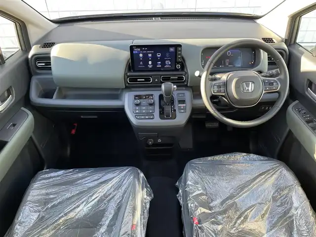 ホンダ フリード ハイブリット e:HEV クロスター 福岡県 2025(令7)年 0.1千km ベージュ 登録済み未使用車/純正9型メモリーナビ(フルセグTV・BT)/バックカメラ/ホンダセンシング/コーナーセンサー/ブラインドスポットインフォメーション/両側パワースライドドア/シートヒーター/リヤクーラー/USBポート/純正LED/純正アルミホイール/プッシュスタート/スマートキー