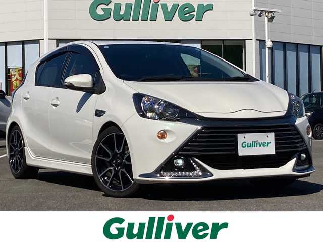 トヨタ アクア G G’s 佐賀県 2015(平27)年 6.5万km ライムホワイトパールクリスタルシャイン 純正ナビ/バックカメラ/クルーズコントロール/ビルトインＥＴＣ/ハーフレザーシート/プッシュスタート/スマートキー/ステアリングスイッチ/フォグライト/ＬＥＤBEAM/純正アルミホイール