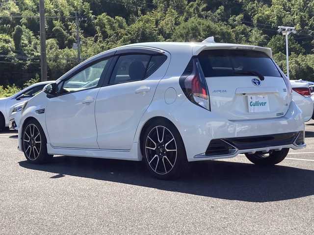 トヨタ アクア G G’s 佐賀県 2015(平27)年 6.5万km ライムホワイトパールクリスタルシャイン 純正ナビ/バックカメラ/クルーズコントロール/ビルトインＥＴＣ/ハーフレザーシート/プッシュスタート/スマートキー/ステアリングスイッチ/フォグライト/ＬＥＤBEAM/純正アルミホイール