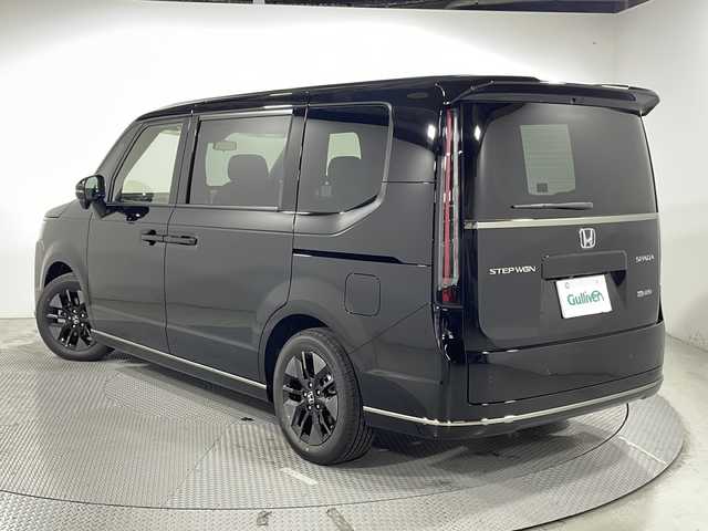 ホンダ ステップワゴン スパーダ eHEV 広島県 2025(令7)年 0.1万km未満 クリスタルブラックパール 登録済み未使用車/11.4インチナビHonda CONNECTナビ LXM-247VFLi/ホンダセンシング/追従クルーズコントロール/BSM/電動リアゲート/オットマン/シートヒーター/前後コーナーセンサー/バックカメラ/スペアキー/両側パワースライドドア/オートマチックハイビーム/減速セレクター/スマートキー