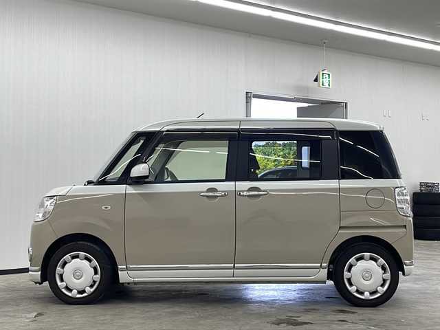 ダイハツ ムーヴ キャンバス X LTD メイクアップ SA Ⅲ 長崎県 2018(平30)年 2.7万km パールホワイトⅢ/ナチュラルベージュマイカメタリック 2トーン 純正メモリナビ（NMZK-W73D）/（フルセグ/DVD/CD/Bluetootｈ）/バックカメラ/両側パワースライド/衝突軽減ブレーキ/横滑り防止機能/レーンキープアシスト/ドライブレコーダー前後/ＥＴＣ/純正フロアマット/オートライト/オートマチックハイビーム/エンジンスタートボタン/パワーステアリング/パワーウィンドウ/アイドリングストップ/盗難防止装置/スマートキー/ベンチシート/保証書/取扱説明書