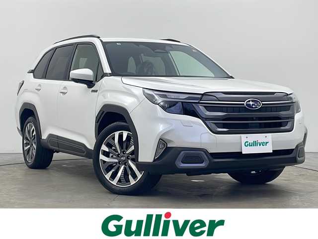 スバル フォレスター プレミアムS:HEV EX 秋田県 2025(令7)年 0.1千km クリスタルホワイトP 4WD/純正ナビ（BT/ACP/AA/AUX/フルセグTV）/全方位カメラ/オートクルーズコントロール/前席パワーシート/前後席シートヒーター/ステアリングヒーター/デジタルインナールームミラー/置くだけ充電/電動リアゲート/オートビークルホールド/LEDヘッドライト/ルーフレール/コーナーセンサー/レーンキープアシスト/スペアキー/取説・保証書